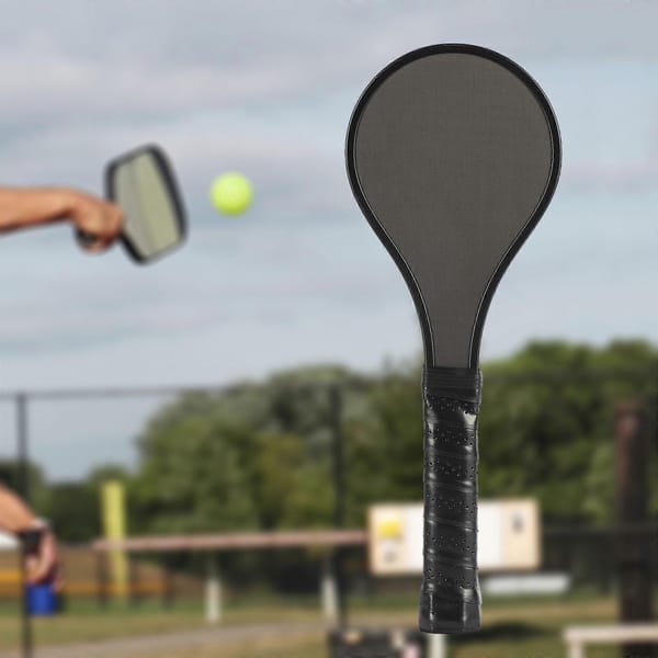Black sweet-spot training paddle for pickleball practice
