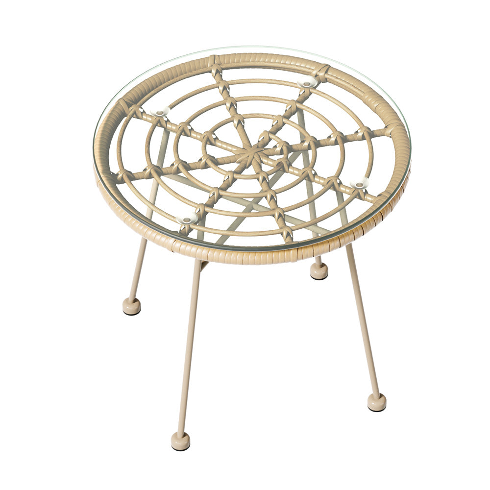 Close-up of the coffee set's round glass-top table and rope-wrapped frame.