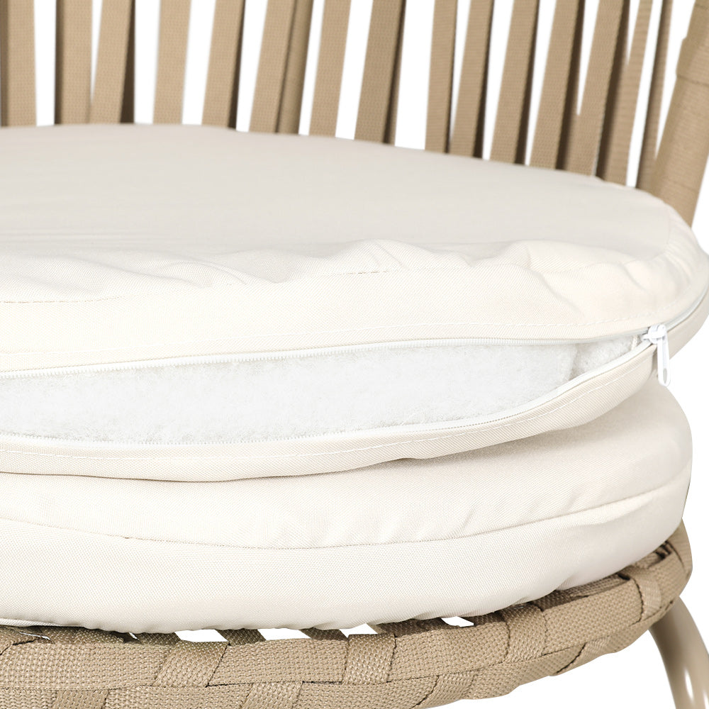 Close-up of the beige seat cushion with its cover unzipped.