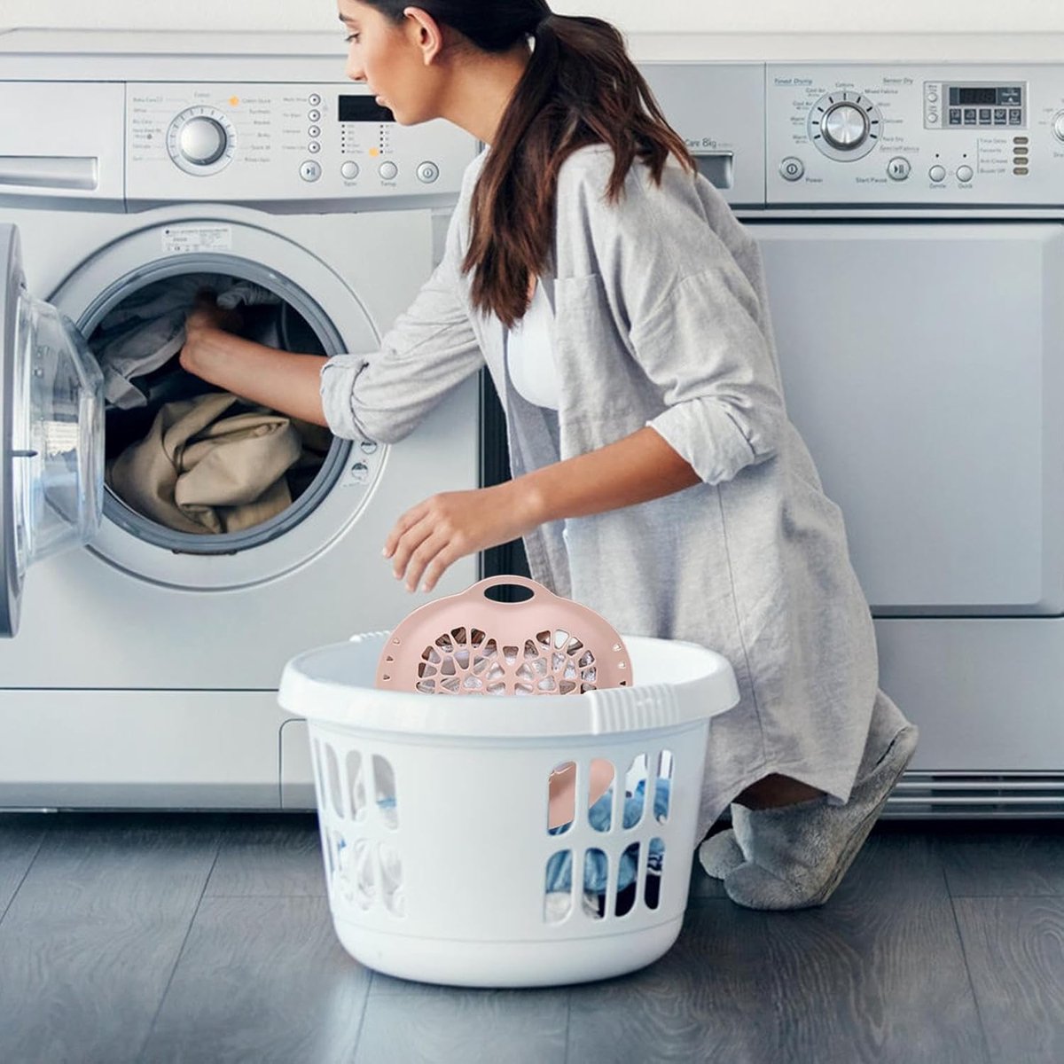 Silicone delicates protector beside a washing machine