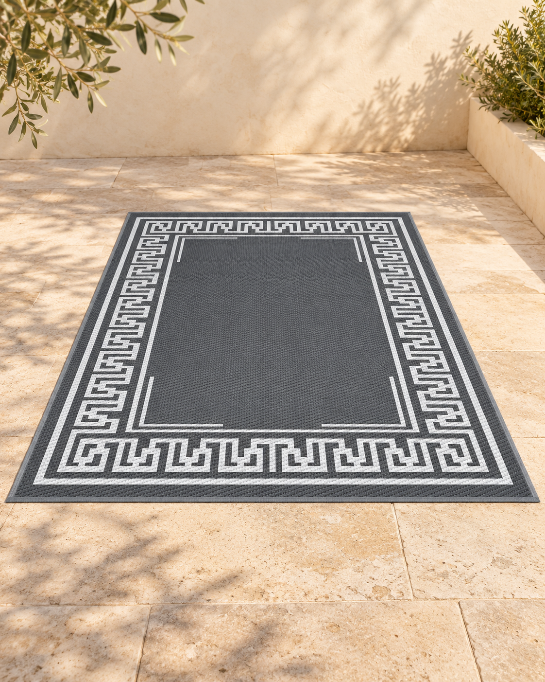 Reversible Outdoor Rug — Grey, 152 × 244 cm in an AI-assisted styled outdoor setting